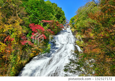Autumn leaves at Yutaki Falls, one of the three famous waterfalls in Oku-Nikko 132327172