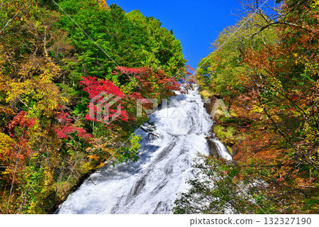Autumn leaves at Yutaki Falls, one of the three famous waterfalls in Oku-Nikko Autumn leaves at Yutaki Falls, one of the three famous waterfalls in Oku-Nikko 132327190