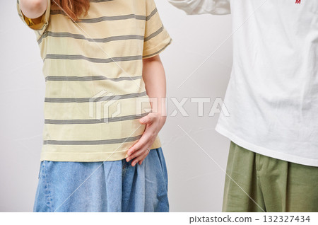 Couple facing each other, pregnant woman, maternity 132327434