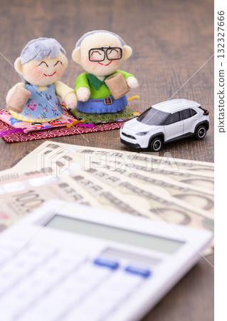 Elderly couple and their car (+ money and calculator) Elderly couple and their car (+ money and calculator) 132327666