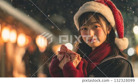 A woman in a Santa costume walking through the city at night 132328099