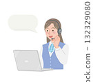 A call center woman answering the phone 132329080