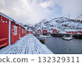Fishing Motorboats and Red Houses Under the Snow 132329311