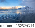 Evening Beach and Snow-Capped Mountains 132329314