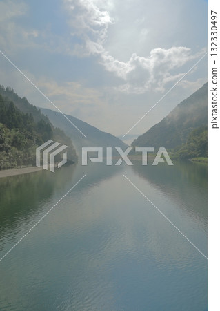 A fantastical view of the Niyodo River shrouded in mist 132330497