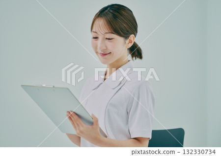 Female nurse providing counseling Female nurse providing counseling 132330734