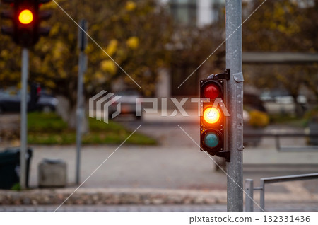 traffic light on the street junction with beautiful bokeh, city with cars in the background traffic light on the street junction with beautiful bokeh, city with cars in the background 132331436