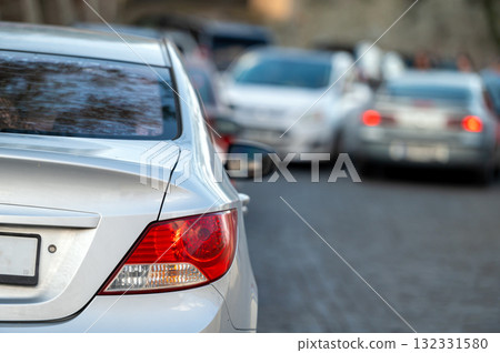 car in big traffic jam. Back view. Blurred background. 132331580