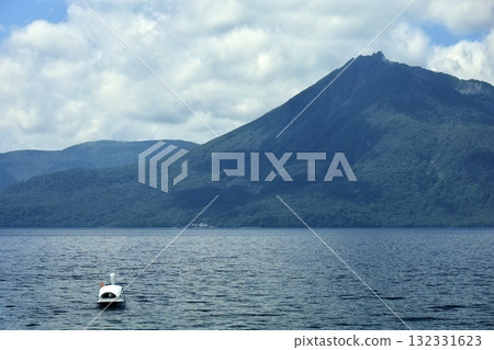Lake Shikotsu and swan boat Lake Shikotsu and swan boat 132331623