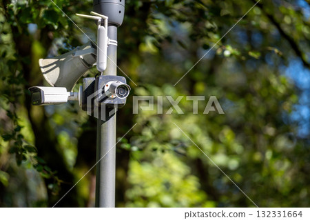 Surveillance camera security cam in the park Surveillance camera security cam in the park 132331664