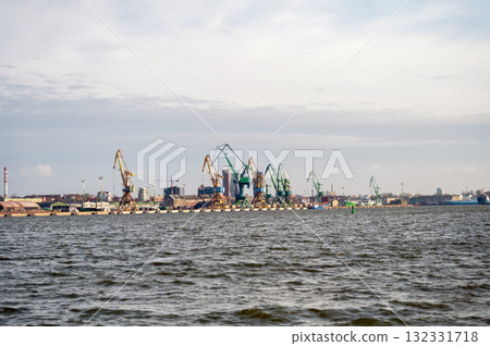 Industrial landscape with cranes in the port of Klaipeda, Lithuania 132331718