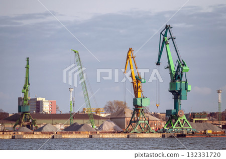 Industrial landscape with cranes in the port of Klaipeda, Lithuania Industrial landscape with cranes in the port of Klaipeda, Lithuania 132331720