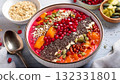 Heart nourishing food, Vibrant smoothie bowl topped with chia seeds, flaxseeds, and pomegranate 132331801