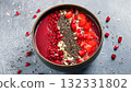 Heart nourishing food, Vibrant smoothie bowl topped with chia seeds, flaxseeds, and pomegranate 132331802
