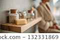 Cozy Bathroom Shelf With Soap Bar And Glass Jars In Soft Morning Light 132331869