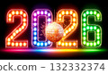 Neon text 2026 with disco ball and sparkles 132332374