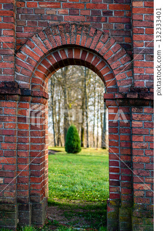 Old Catholic Church red brick gates in city Akniste, Latvia. Closeup 132333401