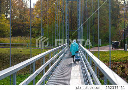 Steel suspension footbridge over the Musa river 132333431