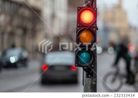traffic light on the street junction with beautiful bokeh, city with cars in the background traffic light on the street junction with beautiful bokeh, city with cars in the background 132333434