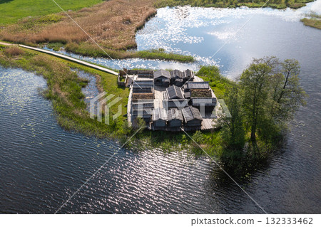 view from above of ancient wooden settlement on river island, recontruction of ancient architecture view from above of ancient wooden settlement on river island, recontruction of ancient architecture 132333462