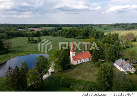 Aerial view of Araisi evangelical lutheran church  and archaeological park near Cesis, Latvia 132333464