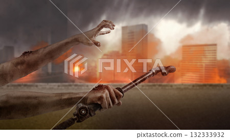 Zombie hands with wounds and blood holding a rusty iron bar and reaching out in the middle of an apocalyptic city. The scene is scary and creepy. Concept of Spooky Halloween Zombie hands with wounds and blood holding a rusty iron bar and reaching out in the middle of an apocalyptic city. The scene is scary and creepy. Concept of Spooky Halloween 132333932