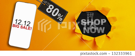 12.12 big sale text on cellphone screen with up to 80% text on the label tag. Copy space. Flash sale concept 132333961