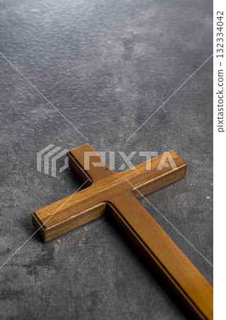 Christian cross on the table. Concept of Christianity, religious, faith, Jesus, or belief 132334042