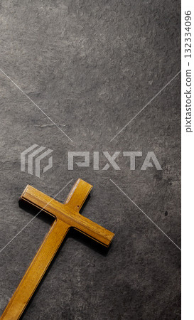 Christian cross on the table. Concept of Christianity, religious, faith, Jesus, or belief 132334096