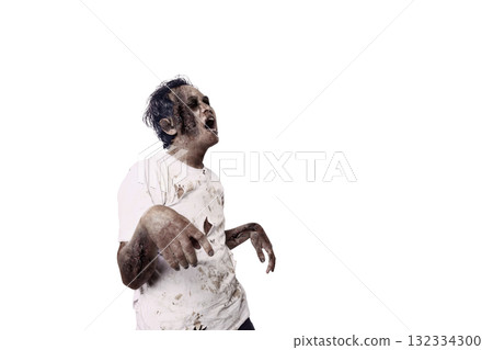 Portrait of an Indonesian southeast asian scary male zombie with a wound and blood on the body isolated over a white background. Spooky expression. Concept of Halloween or Horror Portrait of an Indonesian southeast asian scary male zombie with a wound and blood on the body isolated over a white background. Spooky expression. Concept of Halloween or Horror 132334300