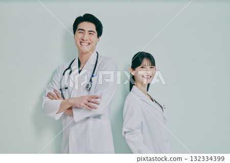 Men and women in white coats Men and women in white coats 132334399