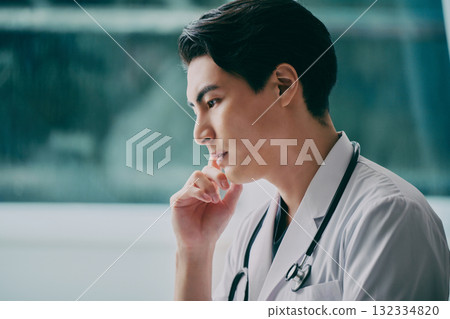 Profile of a young male doctor 132334820