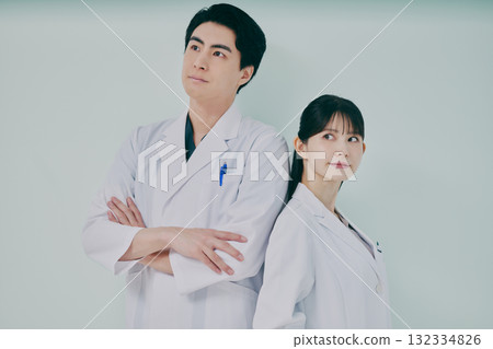Men and women in white coats 132334826