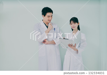 Men and women in white coats 132334831