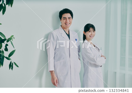Men and women in white coats Men and women in white coats 132334841