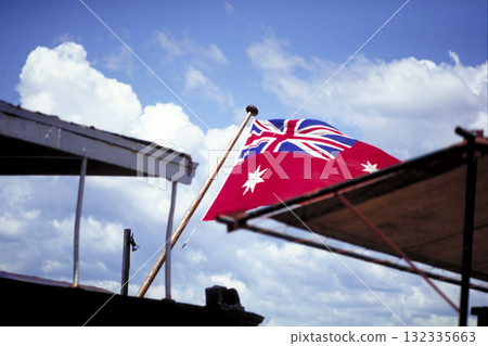 Australian flag flying on a tourist boat in Sydney 132335663
