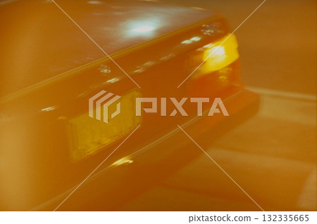 Tail lights of a moving car Tail lights of a moving car 132335665