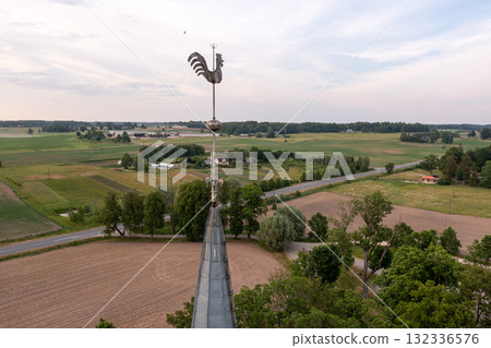 Krimulda Evangelical Lutheran Church tower with rooster, close-up, Latvia, drone view 132336576