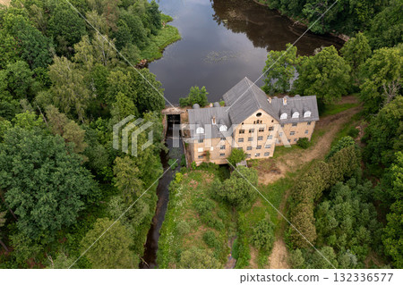 The ancient Katrina mill building in a picturesque location by the lake, Krimulda, Latvia The ancient Katrina mill building in a picturesque location by the lake, Krimulda, Latvia 132336577
