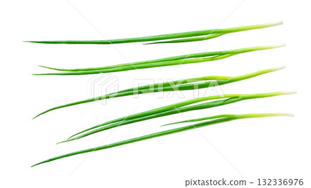 fresh green chives isolated on white background . young green onion isolated. 132336976
