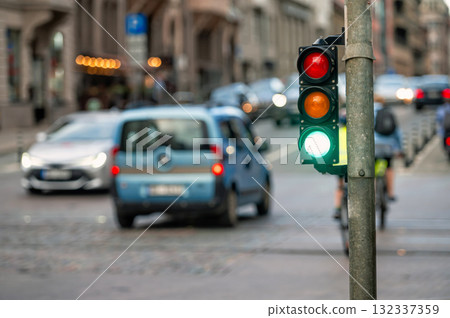 traffic light on the street junction with beautiful bokeh, city with cars in the background traffic light on the street junction with beautiful bokeh, city with cars in the background 132337359
