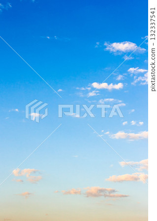 blue sky on a sunny august day. dynamic cloud formations in morning light. windy weather forecast in summer. nature photo for background and compositing 132337541