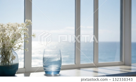 White Flowers and Blue Glass by the Se 132338343