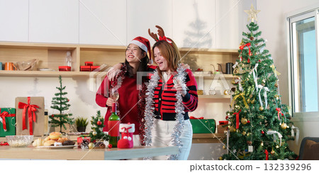 Holiday Celebration. Two friends enjoying Christmas together. Holiday Celebration. Two friends enjoying Christmas together. 132339296