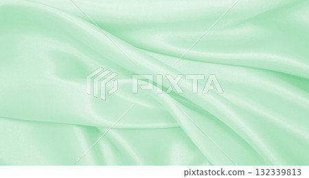 Smooth elegant green silk or satin luxury cloth texture as abstract background. Luxurious background design Smooth elegant green silk or satin luxury cloth texture as abstract background. Luxurious background design 132339813