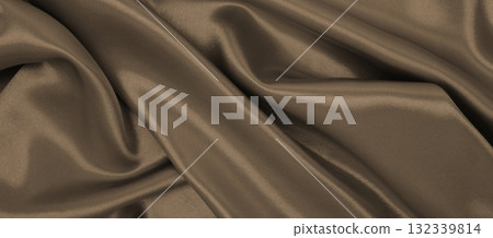 Smooth elegant brown silk or satin luxury cloth texture as abstract background. Luxurious background design. In Sepia toned. Retro style Smooth elegant brown silk or satin luxury cloth texture as abstract background. Luxurious background design. In Sepia toned. Retro style 132339814