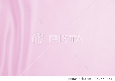 Smooth elegant pink silk or satin texture as wedding background. Luxurious background design Smooth elegant pink silk or satin texture as wedding background. Luxurious background design 132339834