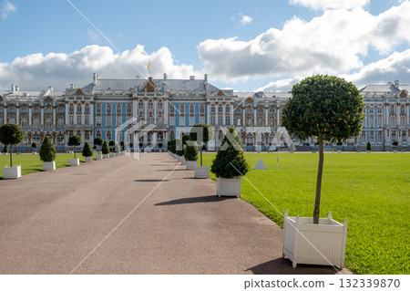 Stunning view of Catherine Palace with manicured gardens and decorative topiaries during a sunny day in Russia Stunning view of Catherine Palace with manicured gardens and decorative topiaries during a sunny day in Russia 132339870