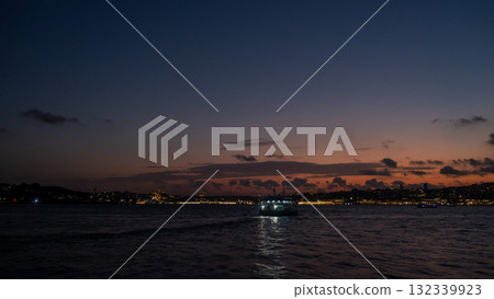 Bosphorus twilight boat cruise revealing city lights and colors at dusk 132339923
