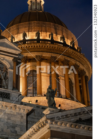 St. Isaac's Cathedral at night, glowing beautifully against the dark sky in Saint Petersburg St. Isaac's Cathedral at night, glowing beautifully against the dark sky in Saint Petersburg 132340923